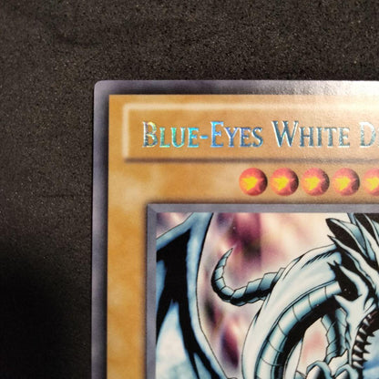 Yu-Gi-Oh Blue-Eyes White Dragon DL09-EN001 rare special edition card with light blue rainbow shine from 2010 tournament
