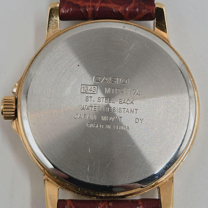 Casio MTP-1174 Quartz Watch with White Dial and Leather Strap for Men — Japan Import