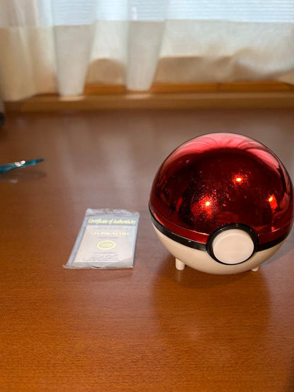 Rare 23K gold-plated Pikachu collectible card from 1999 Burger King US sale with Poké Ball case