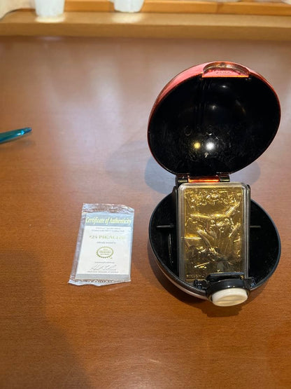 Rare 23K gold-plated Pikachu collectible card from 1999 Burger King US sale with Poké Ball case