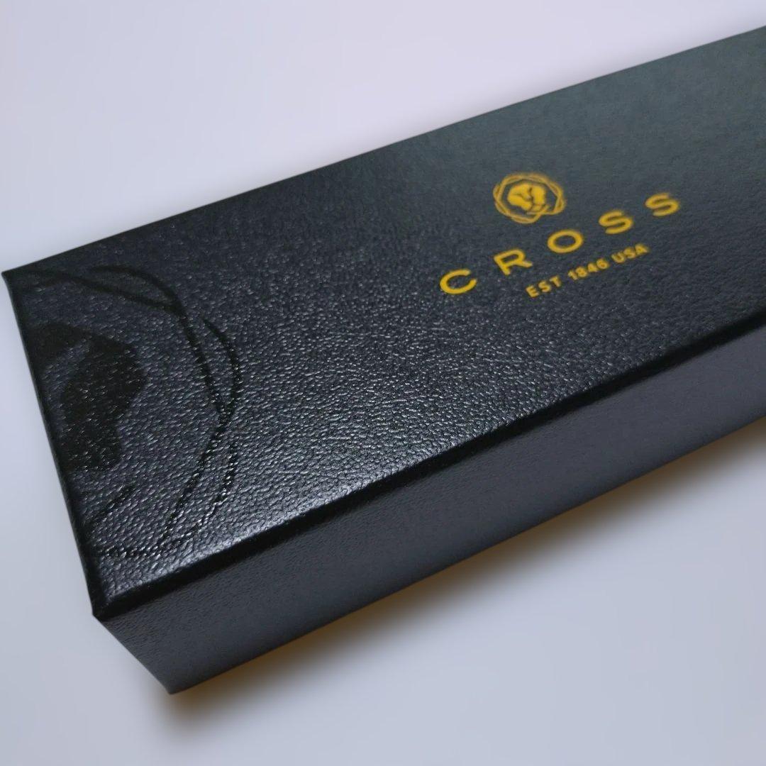 Cross ballpoint pen body shown without case or papers, sleek design suitable for writing and testing purposes.