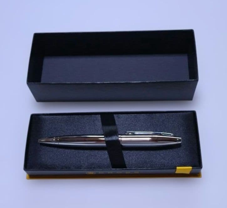 Cross ballpoint pen body shown without case or papers, sleek design suitable for writing and testing purposes.