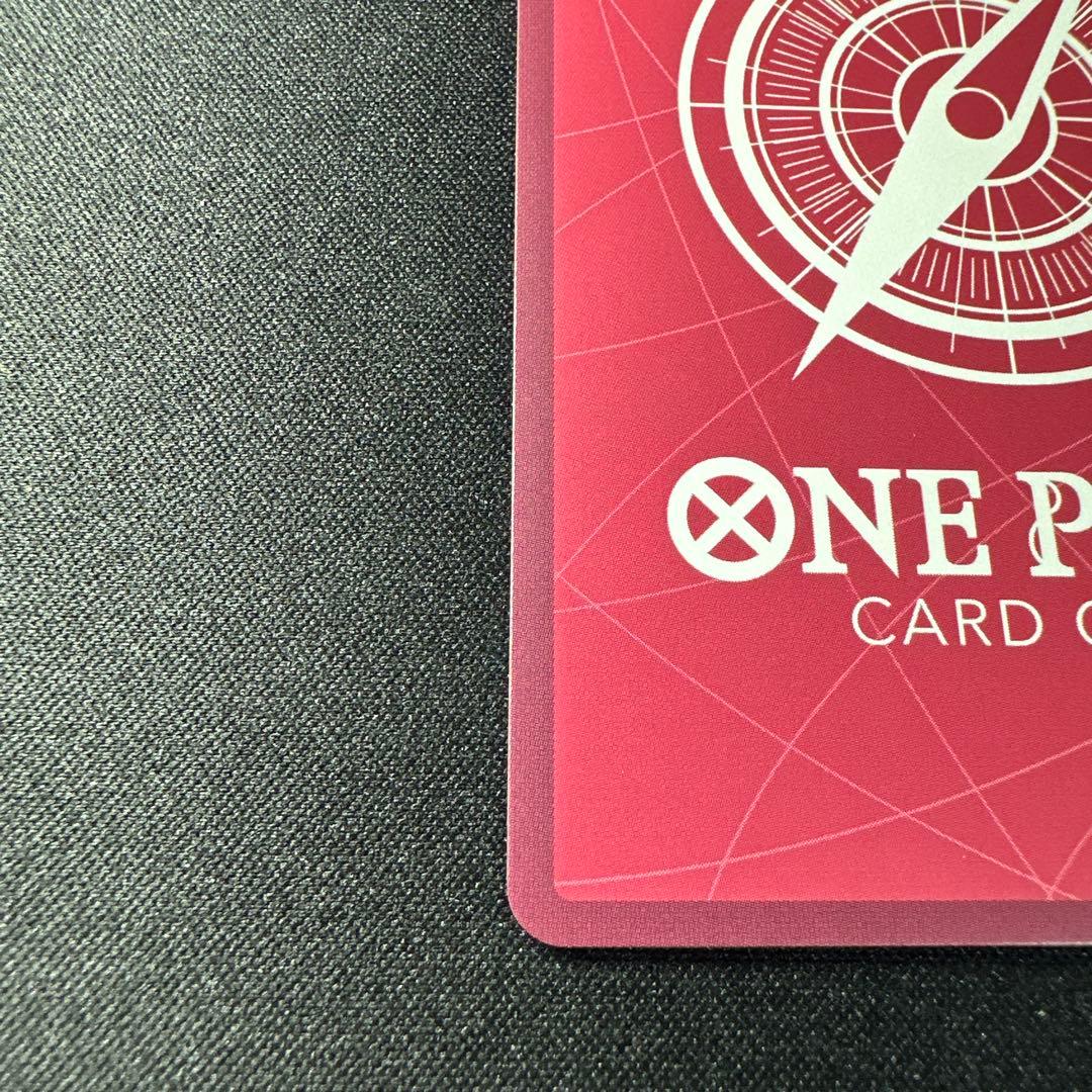 One Piece Card Game Vero Betty Leader Parallel card OP-05-002 with gold lettering in sleeve and loader