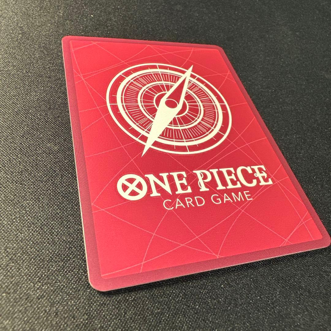 One Piece Card Game Vero Betty Leader Parallel card OP-05-002 with gold lettering in sleeve and loader