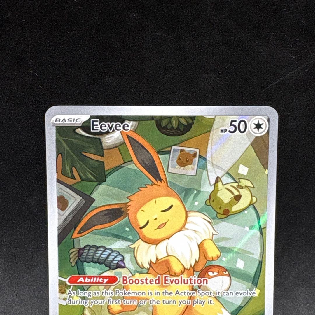 Pokemon Eevee SVPEN 173 promotional card with Boosted Evolution ability, 50 HP, illustrated by Makura Tami