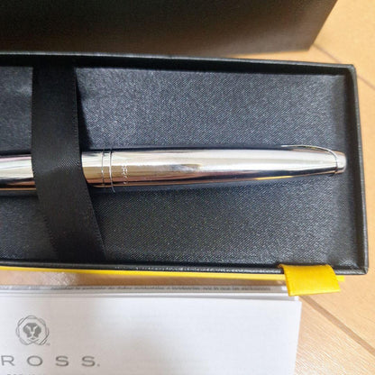 Silver Cross ballpoint pen with dedicated special case and user manual displayed