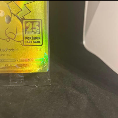Unopened 25th anniversary Pokemon Golden Pikachu collectible card in hard case from Golden Box series