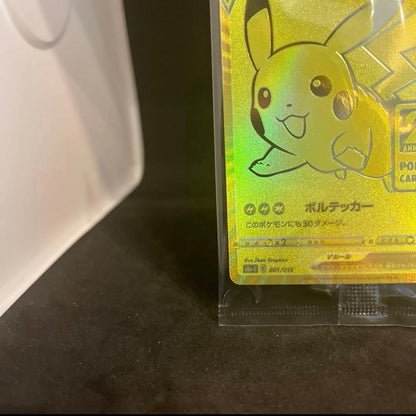 Unopened 25th anniversary Pokemon Golden Pikachu collectible card in hard case from Golden Box series