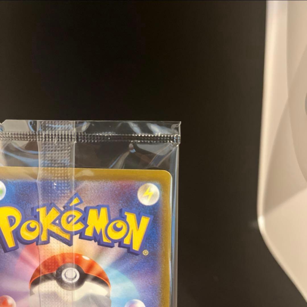 Unopened 25th anniversary Pokemon Golden Pikachu collectible card in hard case from Golden Box series