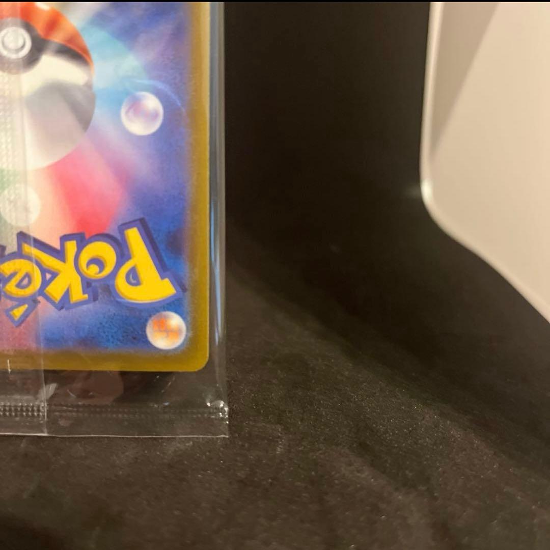Unopened 25th anniversary Pokemon Golden Pikachu collectible card in hard case from Golden Box series