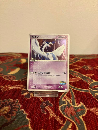Pokemon Geer Promo Lugia collectible card with blue sheet from Japan Import showing 80 HP and Aero Blast attack