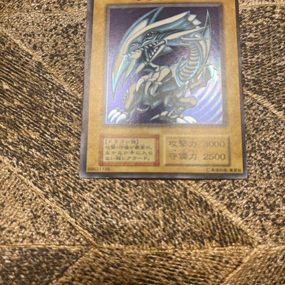 Pair of Bandai Blue-Eyes White Dragon 8th Edition Yu-Gi-Oh! cards from Japan import showing front design