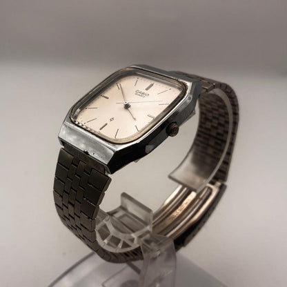 Casio MQ-303 Vintage Square Quartz Watch with Genuine Silver Dial and Stainless Steel Band — Japan Import