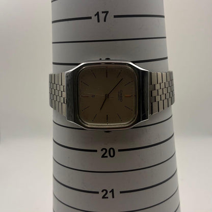 Casio MQ-303 Vintage Square Quartz Watch with Genuine Silver Dial and Stainless Steel Band — Japan Import