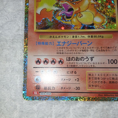 Classic Pokemon Charizard card with clean surface and small chip on upper right corner of the back