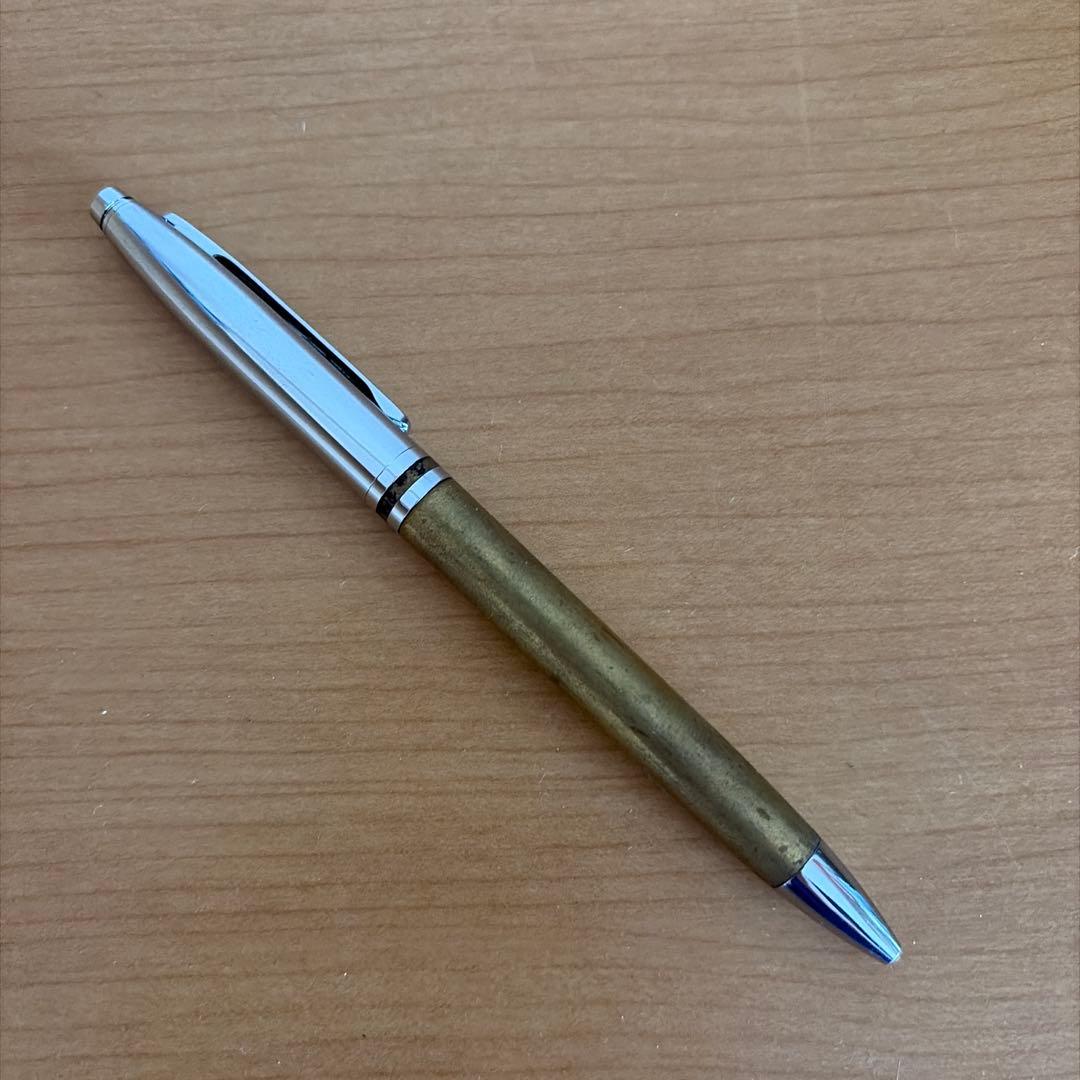Old vintage-style Cross ballpoint pen with a classic design and metallic finish