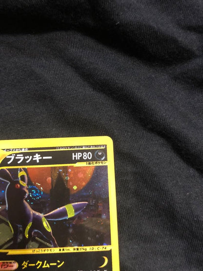 Pokemon Card Dark Town Sylveon Holo Initial Edition in protective sleeve, no visible damage
