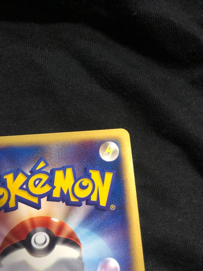 Pokemon Card Dark Town Sylveon Holo Initial Edition in protective sleeve, no visible damage
