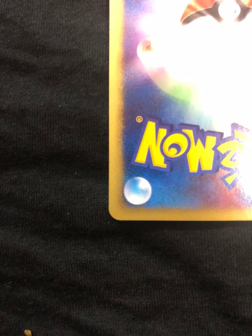 Pokemon Card Dark Town Sylveon Holo Initial Edition in protective sleeve, no visible damage