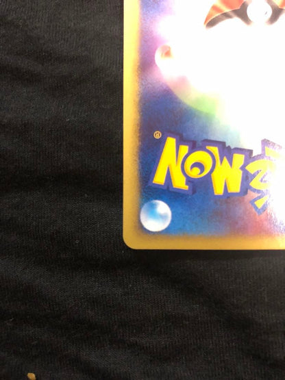 Pokemon Card Dark Town Sylveon Holo Initial Edition in protective sleeve, no visible damage