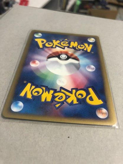 Pokemon Card Dark Town Sylveon Holo Initial Edition in protective sleeve, no visible damage
