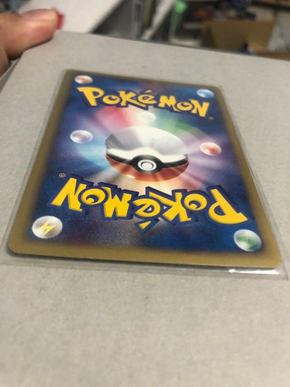 Pokemon Card Dark Town Sylveon Holo Initial Edition in protective sleeve, no visible damage