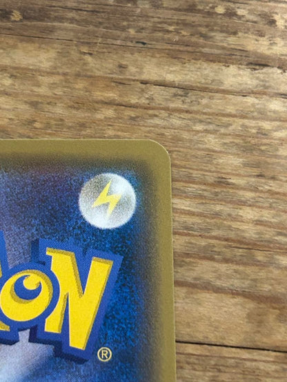 Promo Pokemon card featuring Boss Garbed Pikachu Aqua Squad from Sun & Moon series with minor scratch
