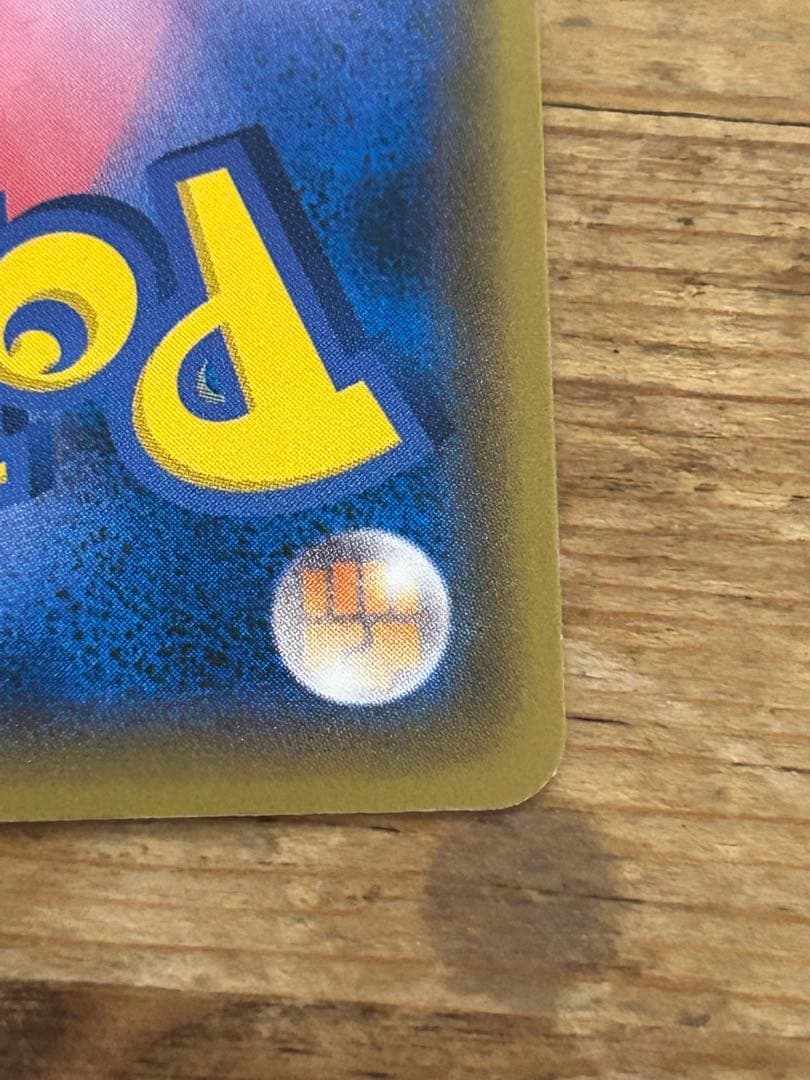 Promo Pokemon card featuring Boss Garbed Pikachu Aqua Squad from Sun & Moon series with minor scratch