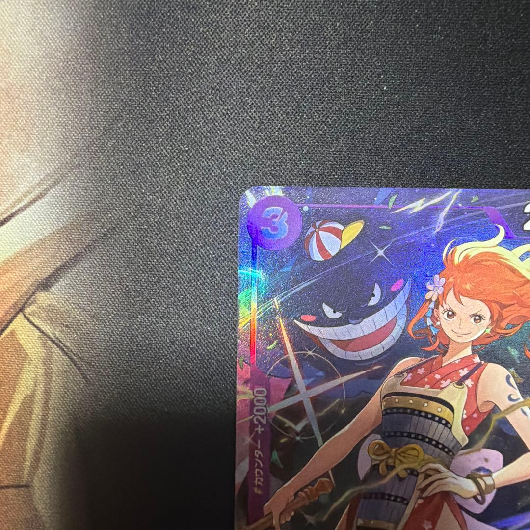 Set of four Nami Premium Card Collection Best Selection Vol.4 collectible cards in protective sleeves