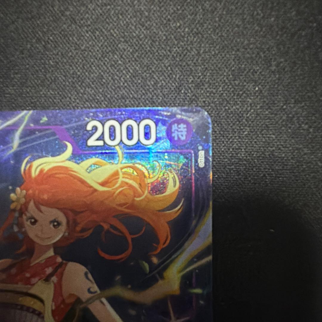 Set of four Nami Premium Card Collection Best Selection Vol.4 collectible cards in protective sleeves