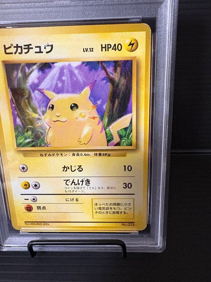 Pokemon Card Pikachu 1st Edition PSA6 graded with no mark and old back in protective case with minor scratches