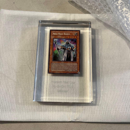 Yugioh Sakuretsu Armor White Mage card embedded in crystal trophy awarded to top tournament winner