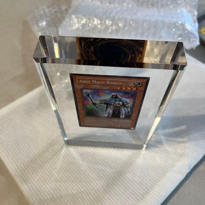 Yugioh Sakuretsu Armor White Mage card embedded in crystal trophy awarded to top tournament winner