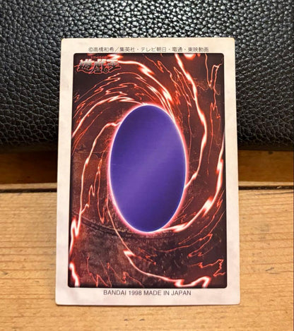 Bandai Blue-Eyes White Dragon Yugioh trading card from 1999 Japan import displayed on white background