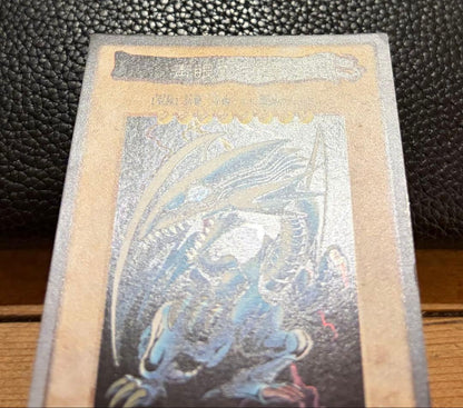 Bandai Blue-Eyes White Dragon Yugioh trading card from 1999 Japan import displayed on white background