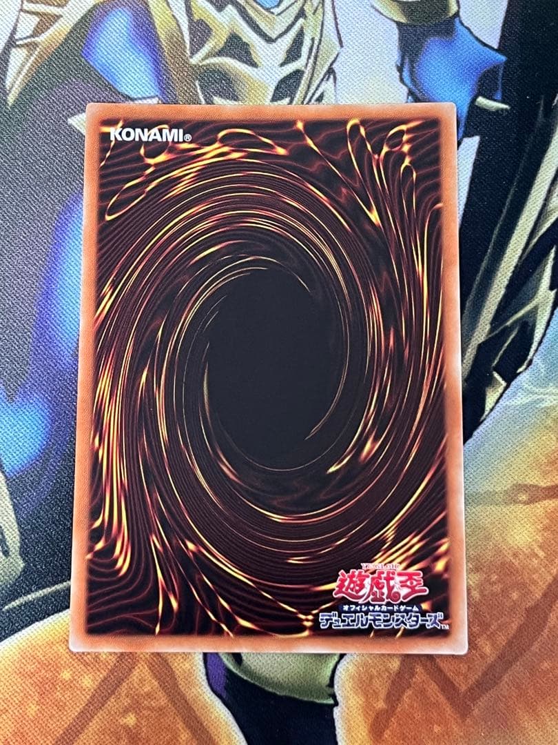 Black Magician Girl 20th Anniversary trading card with scratches and white flecks visible