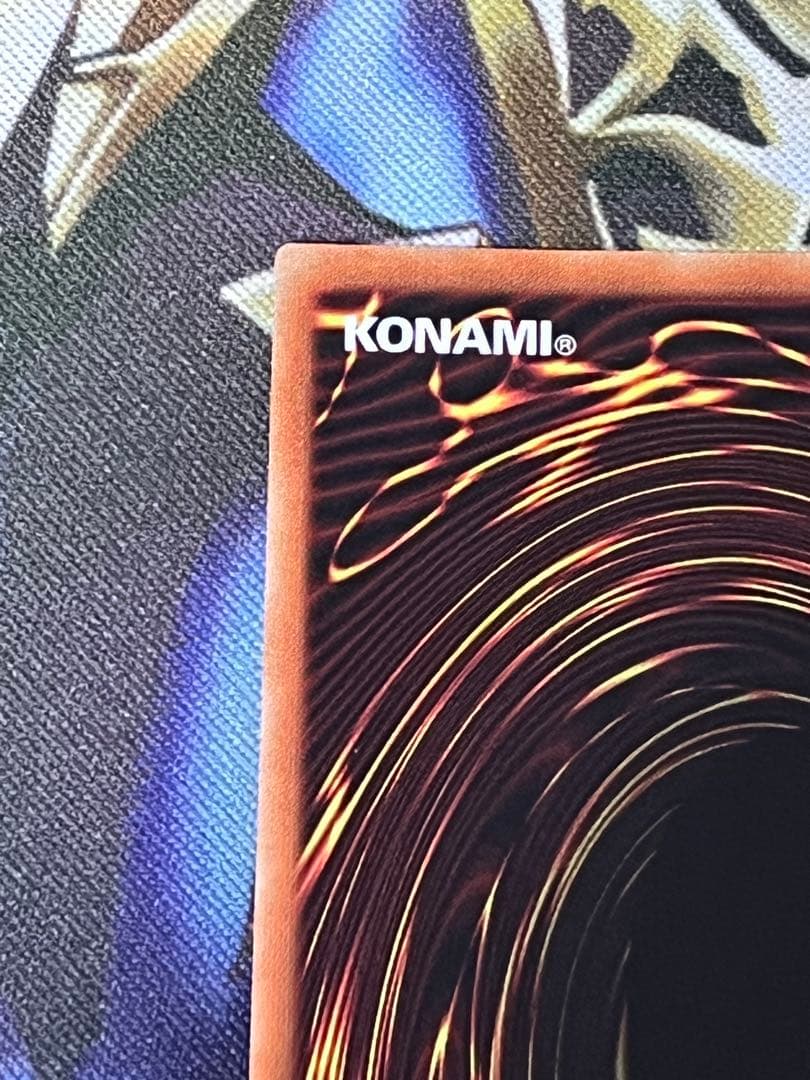 Black Magician Girl 20th Anniversary trading card with scratches and white flecks visible
