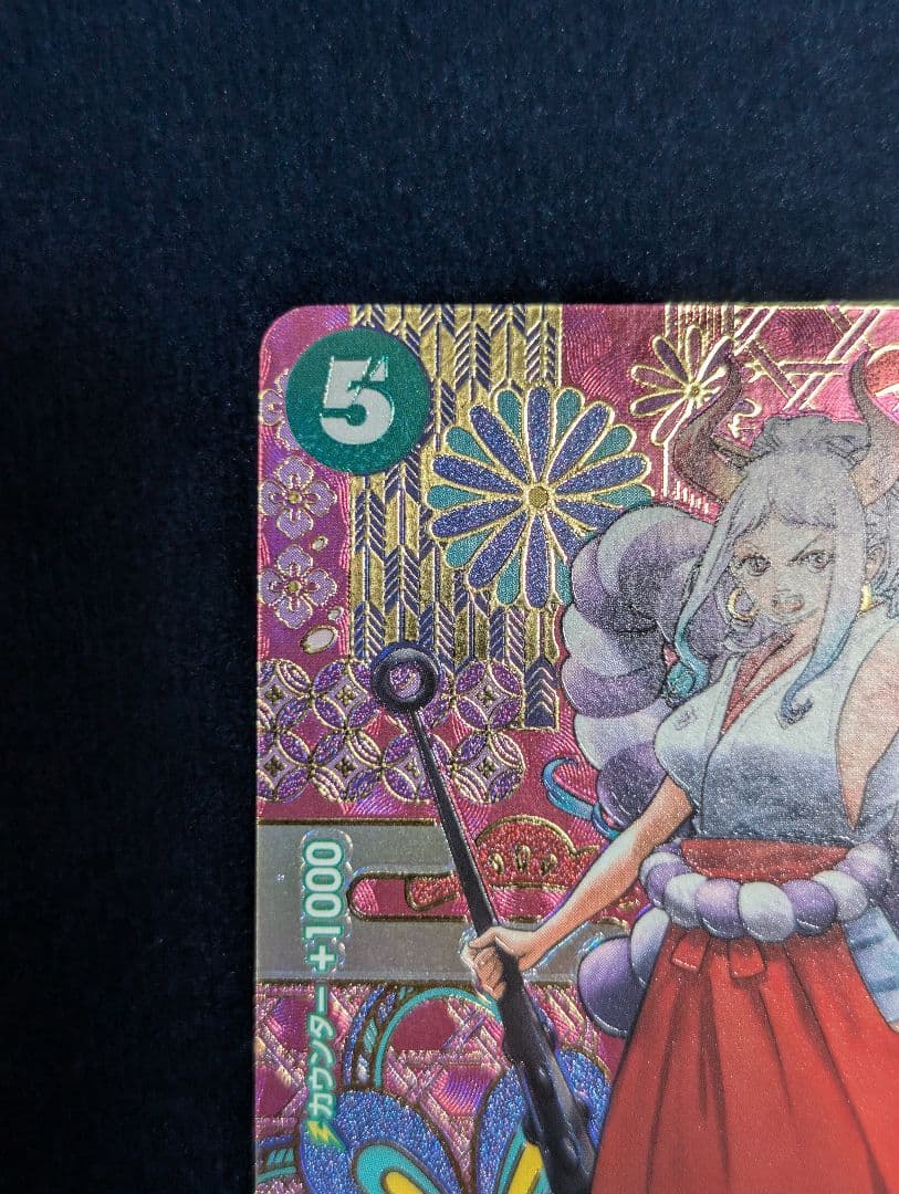 One Piece Card Game Yamato SP OP01-121 Parallel card with faint line scratch on back, shown in protective sleeve