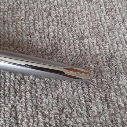 Cross Titanium Gray Ballpoint Pen in metal with sleek gray finish, brand new and unused.