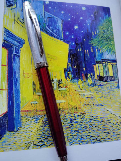 Sheaffer 100 Year fountain pen with red body, silver hairline stainless steel cap, white dot clip, and F nib