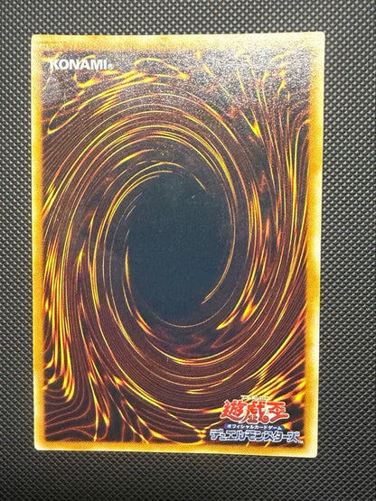 Blue-Eyes Ultimate Dragon Relief card SDX-001 from Japan with visible wear and white spots