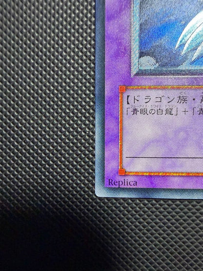 Blue-Eyes Ultimate Dragon Relief card SDX-001 from Japan with visible wear and white spots