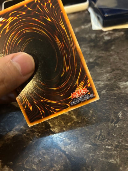 Yugi-Oh Early Ultra Rare Red Eyes Black Dragon playing card from OCG with minor wear and scratches