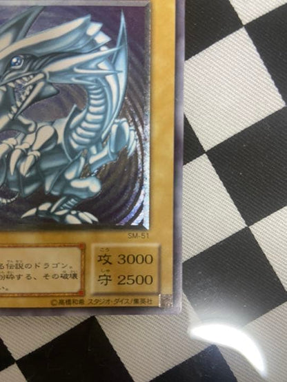 Yugioh Blue-Eyes White Dragon Relief single card in Japanese with repaired fold mark and dented name area