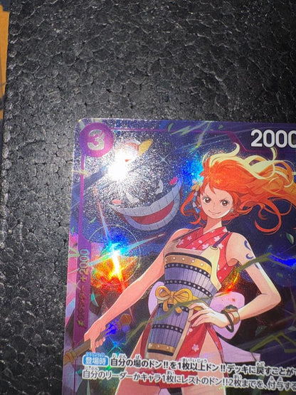 One Piece Nami promotional premium card in Japanese, showing front artwork and condition