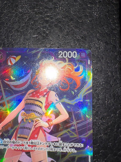 One Piece Nami promotional premium card in Japanese, showing front artwork and condition