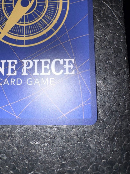 One Piece Nami promotional premium card in Japanese, showing front artwork and condition