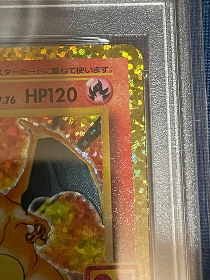 Pokemon 25th Anniversary Charizard collectible card graded PSA 10 with slight imperfections visible