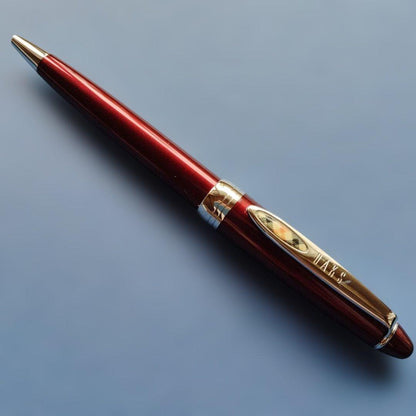 DAKS red ballpoint pen with silver clip and cap on white background metal body Japanese import
