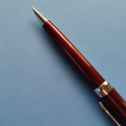 DAKS red ballpoint pen with silver clip and cap on white background metal body Japanese import